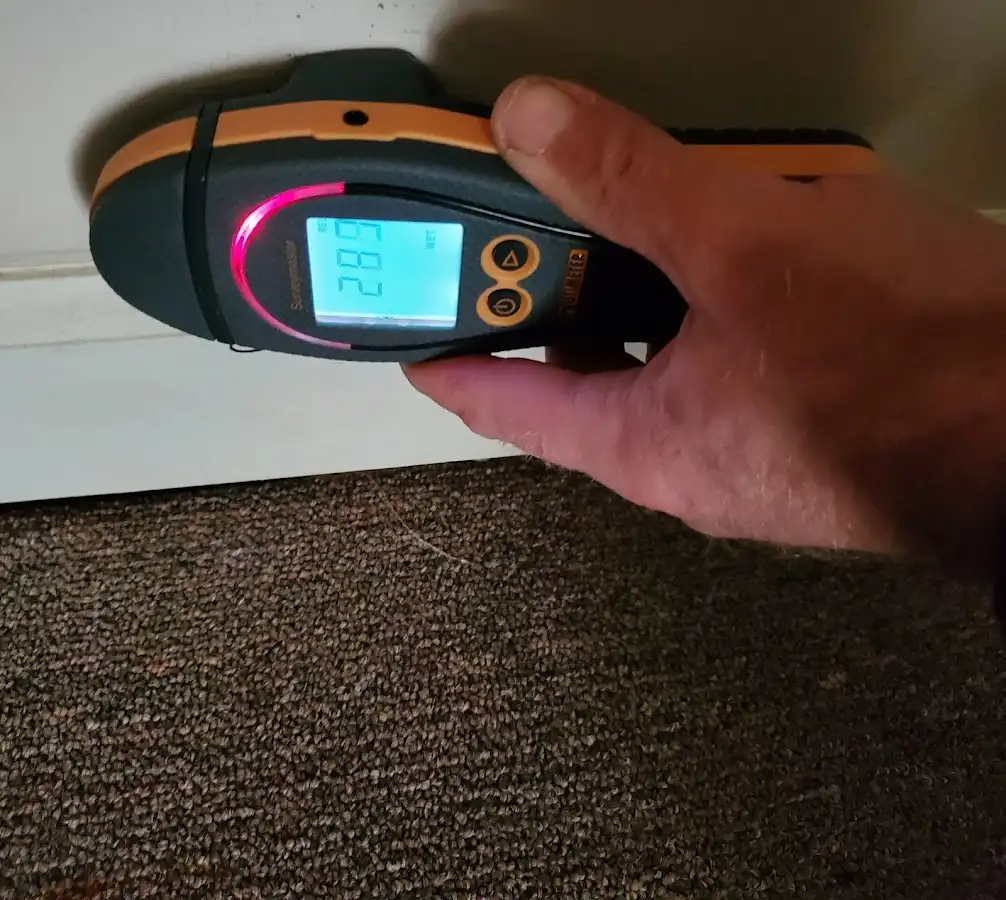 Moisture detection at baseboard during Mold Inspection & Testing in Lilburn